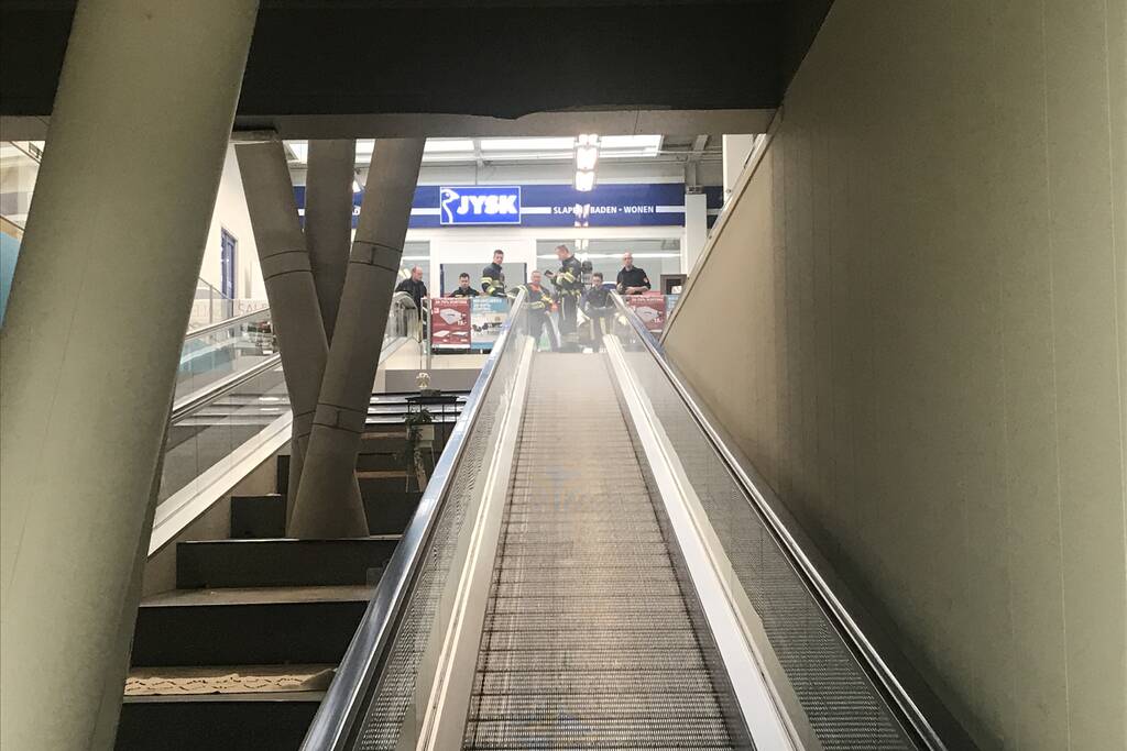 Veel rook bij kortsluiting in een roltrap