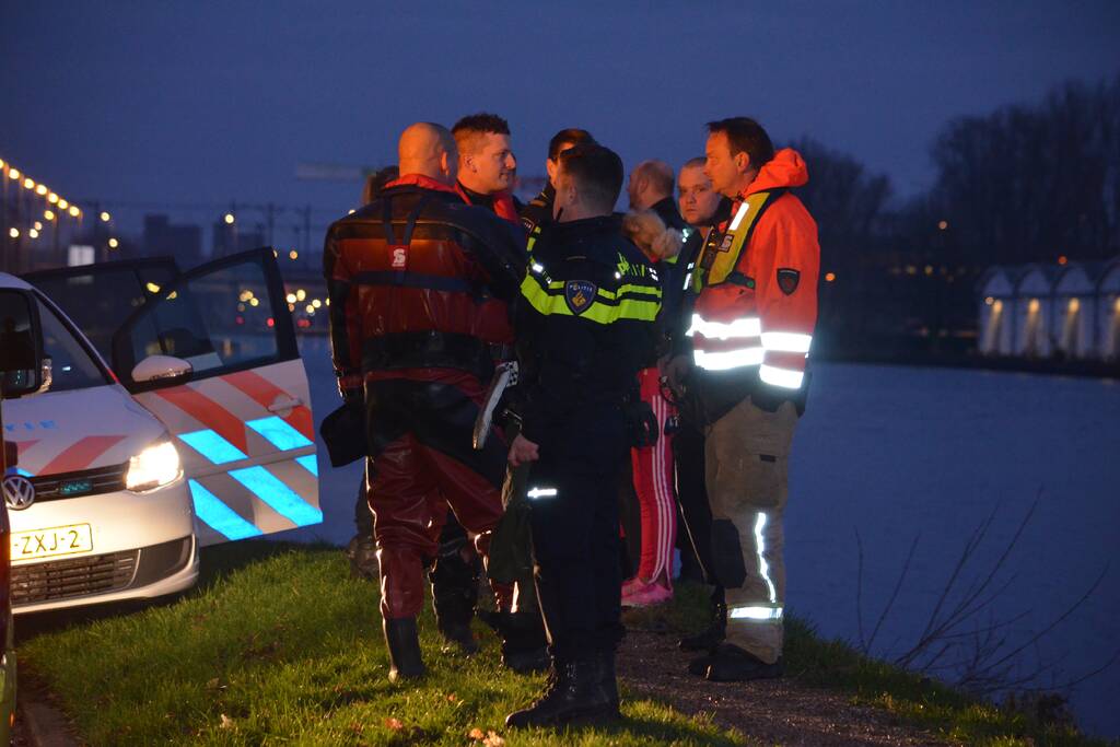 Persoon te water geraakt in kanaal