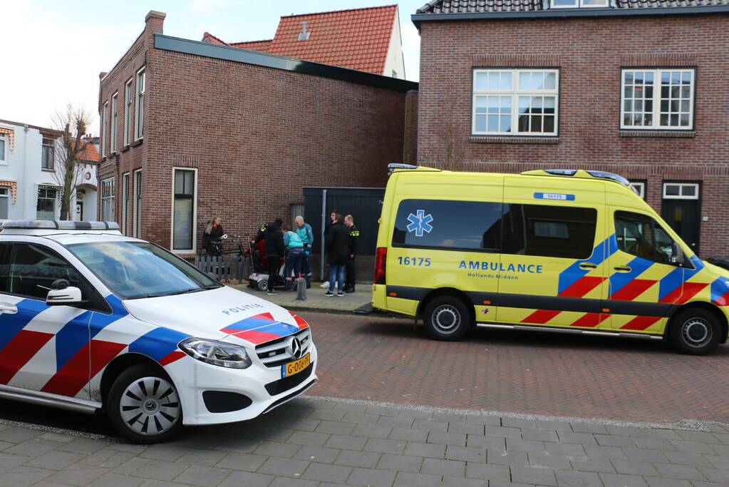 Persoon in scootmobiel ten val