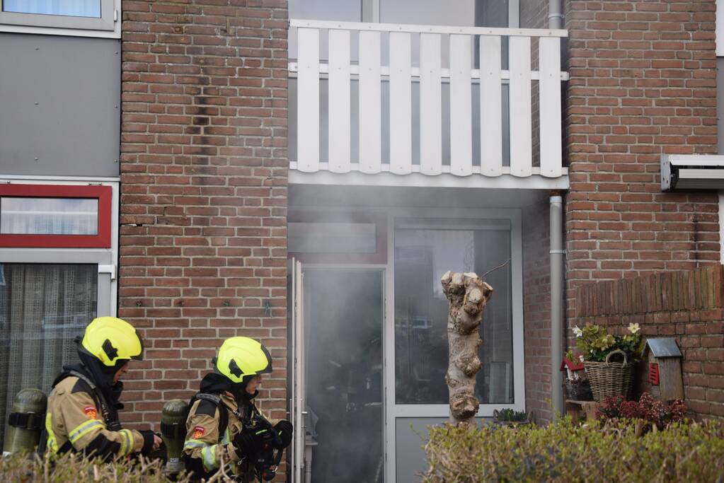 Geiser in woning vat vlam
