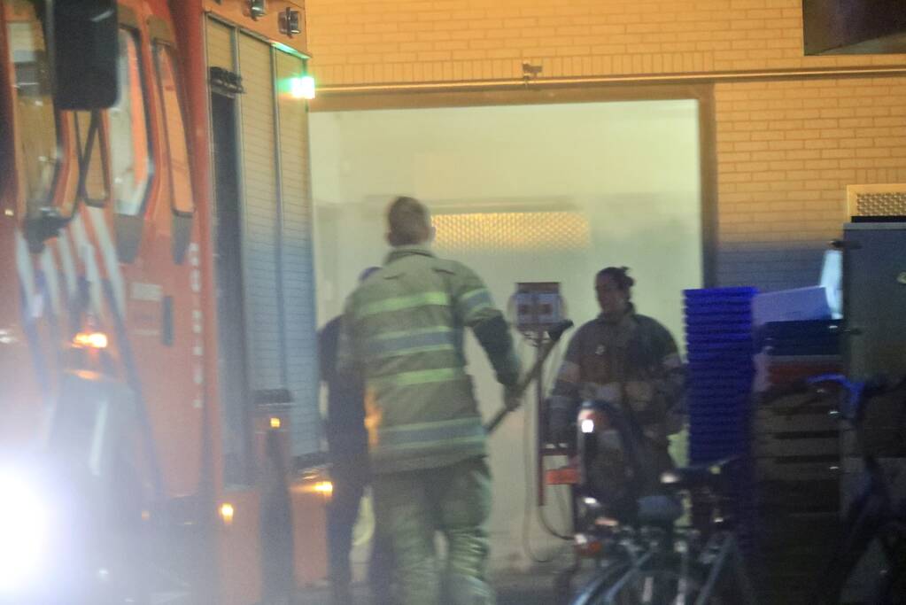 Visgroothandel vol rook na brand in koelcel