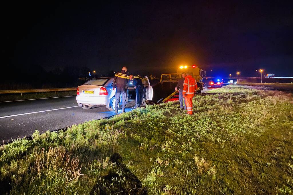 Dronken bestuurder valt in slaap op achterbank