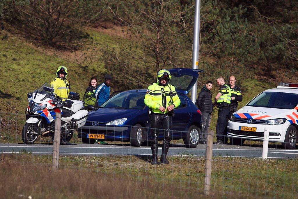 Twee mannen met getrokken wapens aangehouden na achtervolging