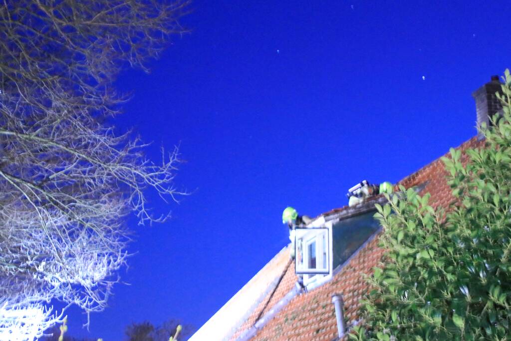 Dakkapel woonboerderij in brand