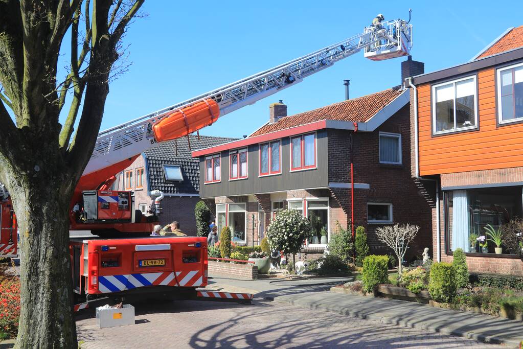 Woning vol rook bij brand in schoorsteen