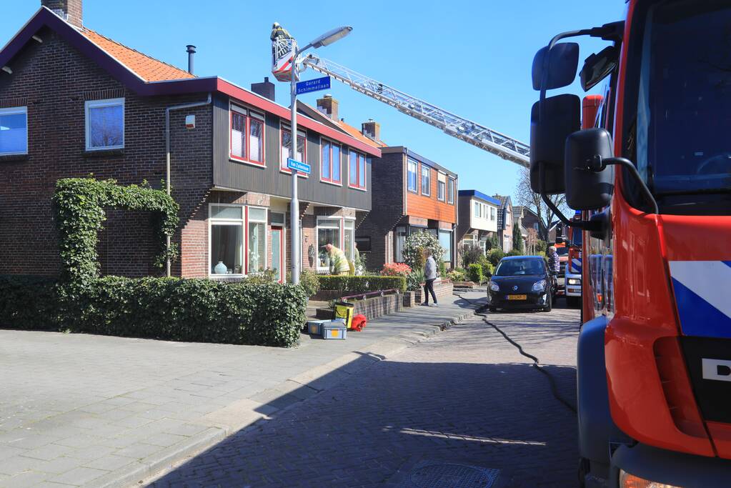 Woning vol rook bij brand in schoorsteen