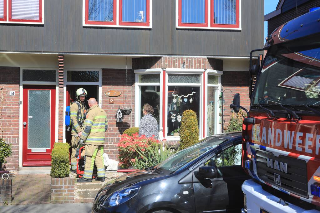 Woning vol rook bij brand in schoorsteen