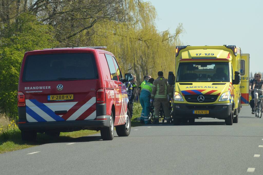 Persoon belandt met scootmobiel in het water