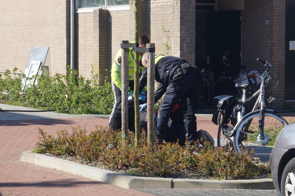 Man in boeien geslagen bij woningbrand