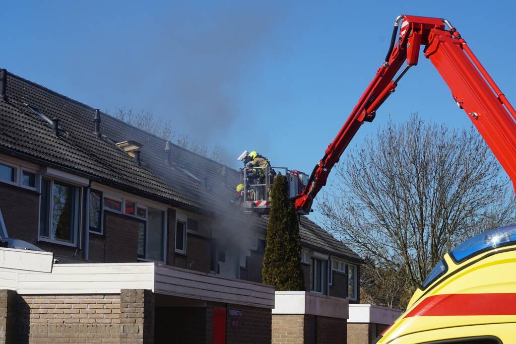 Man in boeien geslagen bij woningbrand