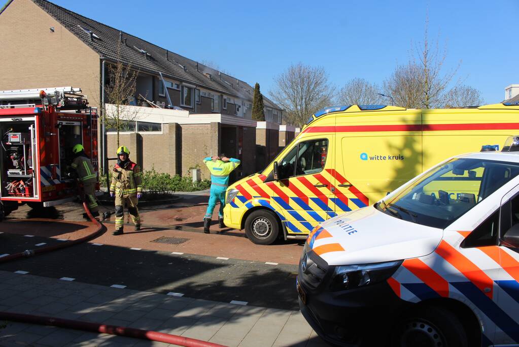 Man in boeien geslagen bij woningbrand