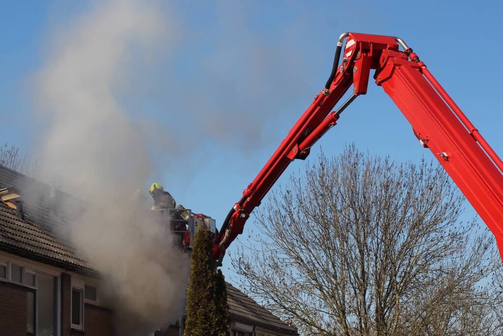 Man in boeien geslagen bij woningbrand