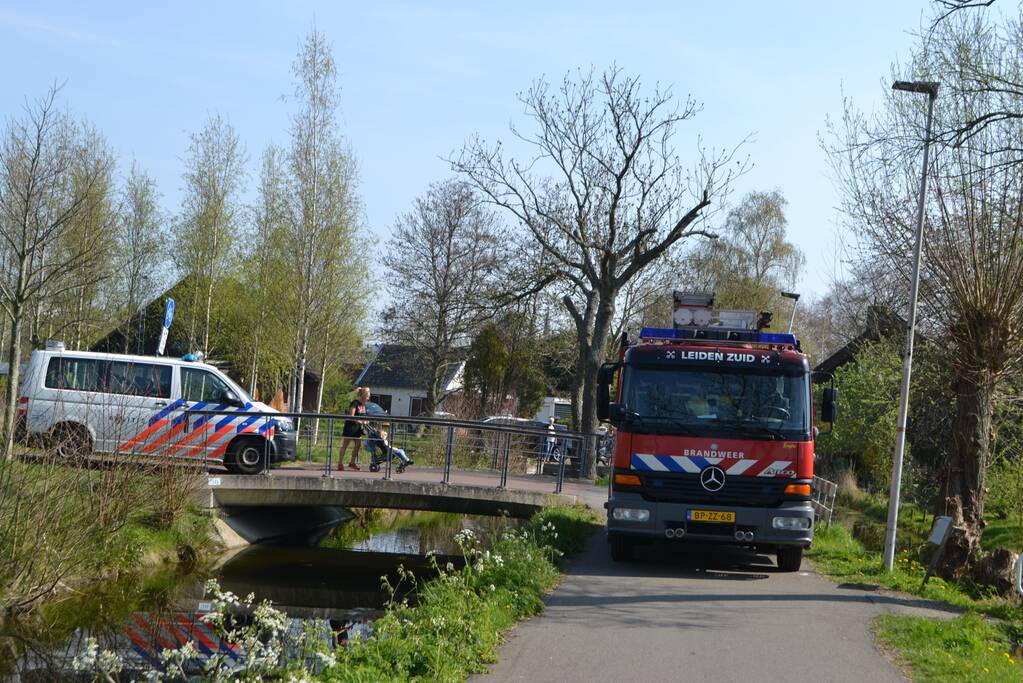 Man bekneld in leiding septictank