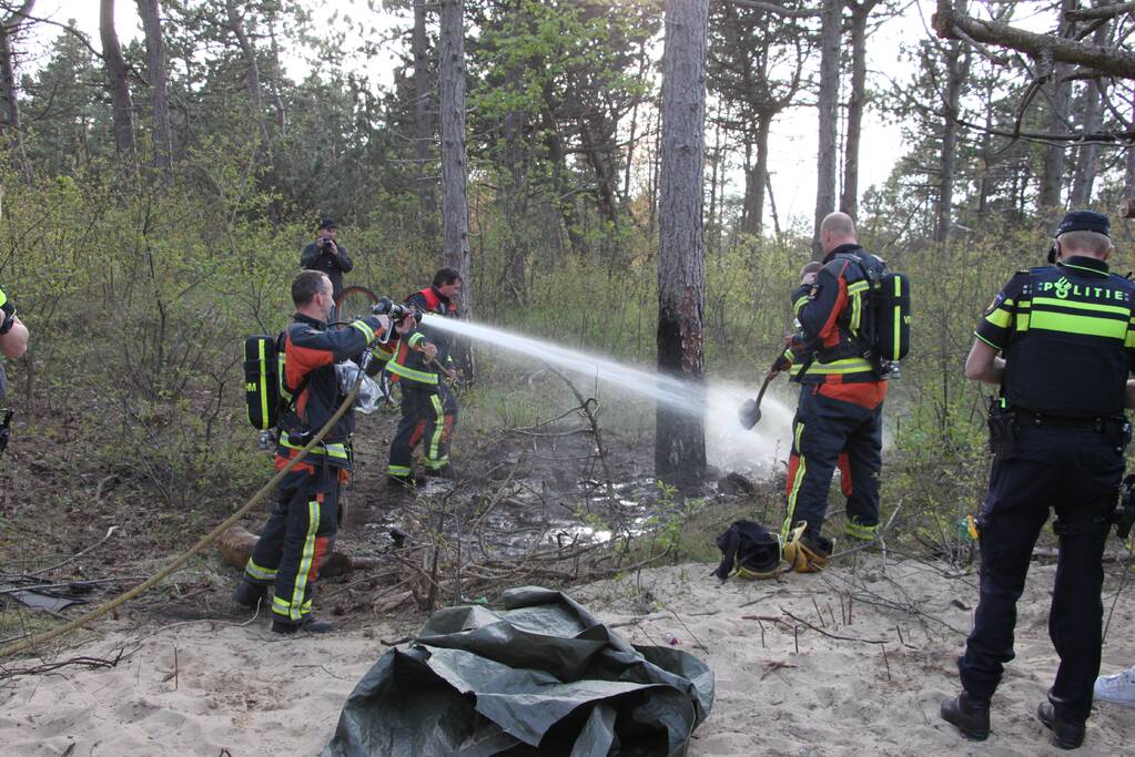 Brand in bos vermoedelijk aangestoken