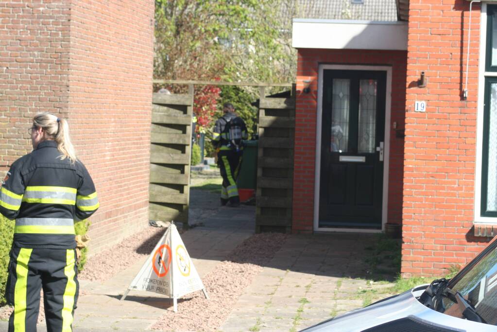 Gaslekkage in achtertuin van woning