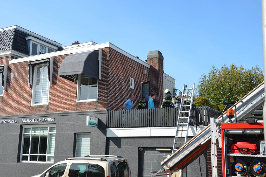 Brand op dakterras van woning