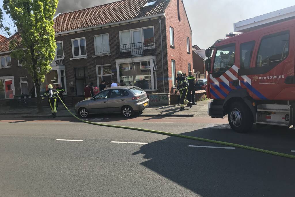 Forse rookwolken bij brand in woning
