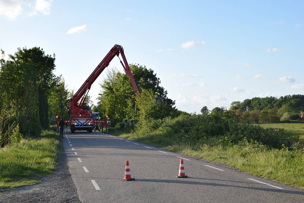 Gewonde bij auto te water
