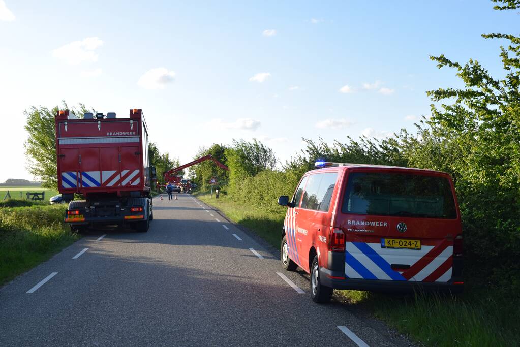 Gewonde bij auto te water