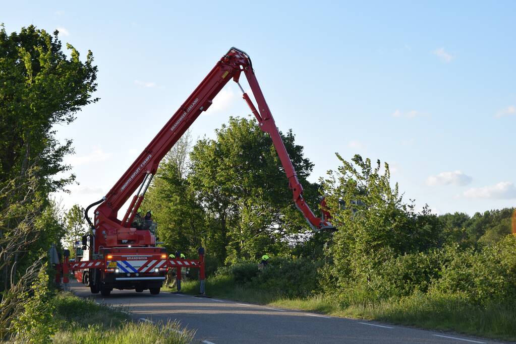 Gewonde bij auto te water