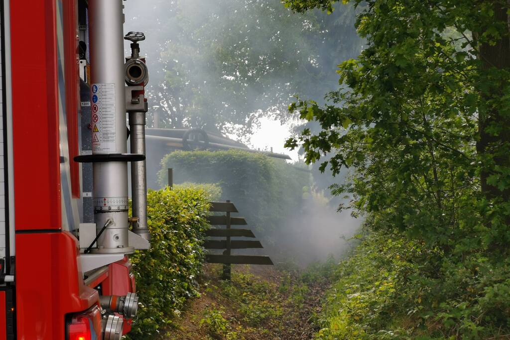 Stuk bosschage in brand