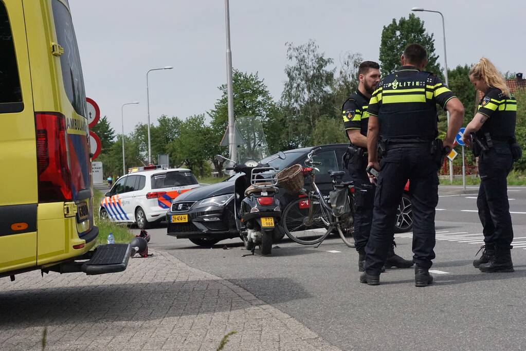 Gewonden bij aanrijding met scooter