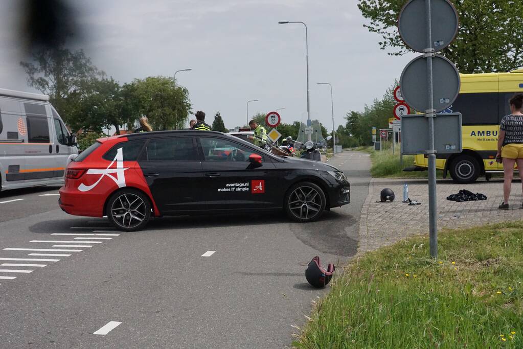 Gewonden bij aanrijding met scooter