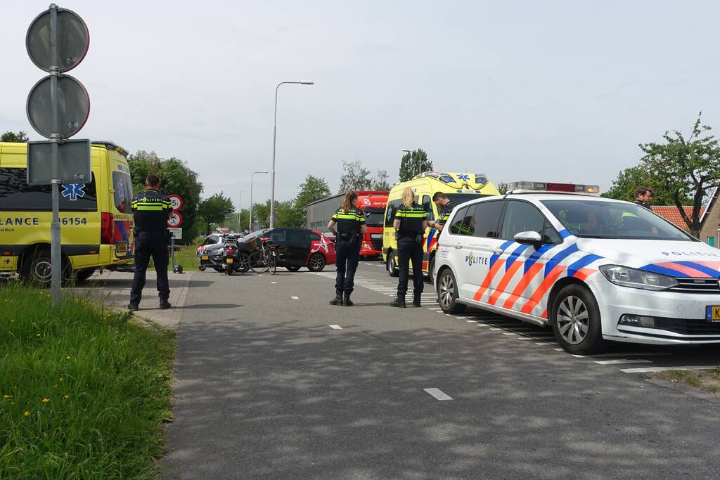 Gewonden bij aanrijding met scooter