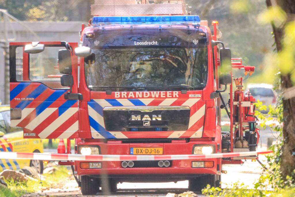 Flinke brand in portiek van galerijflat