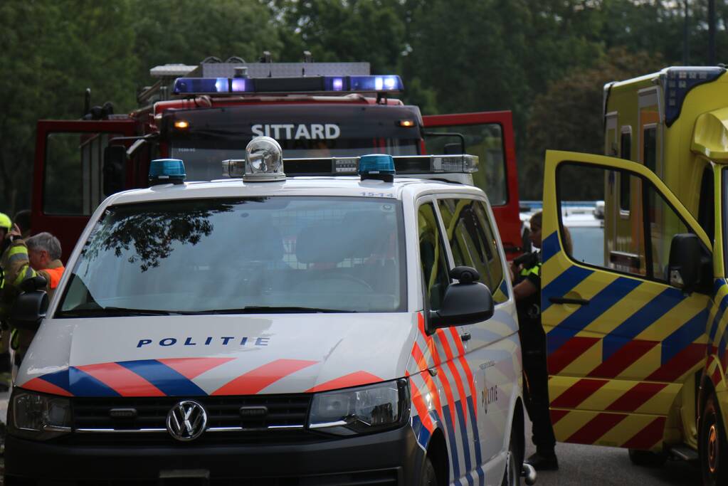 Bewoner laat brandweer niet binnen bij brand