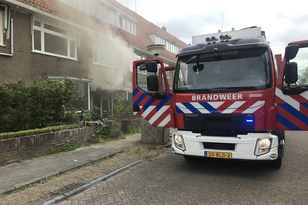 Veel rook bij brand in woning