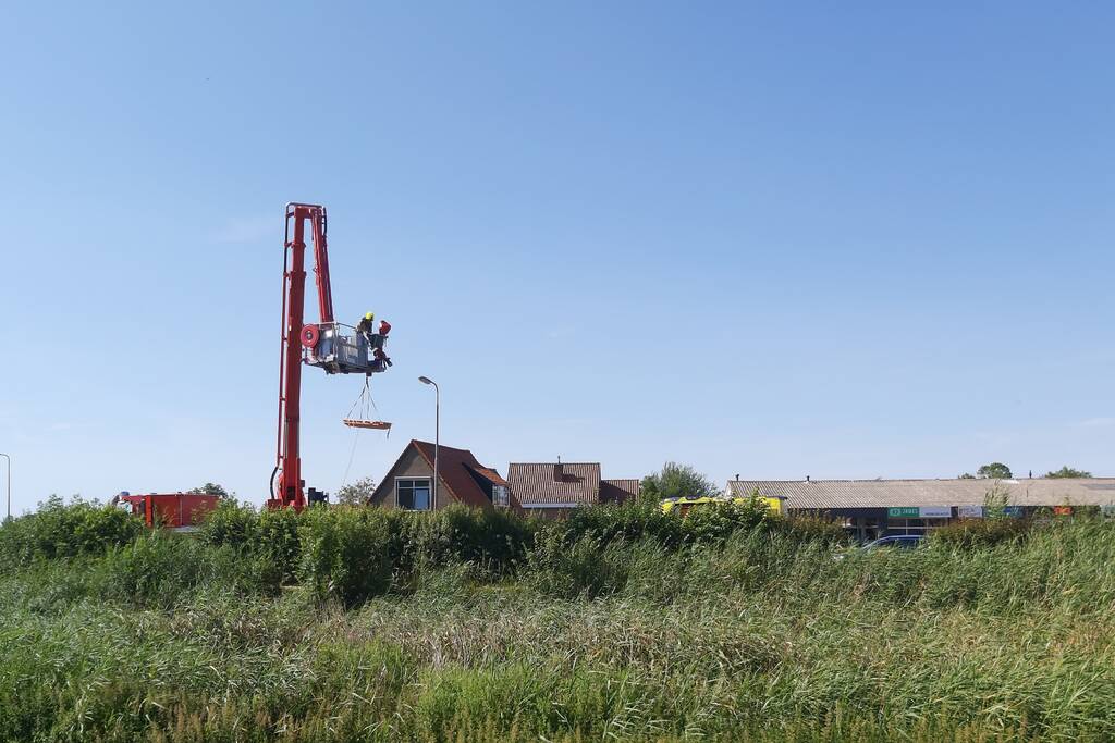 Bestuurder scootmobiel te water