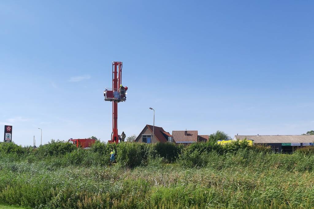 Bestuurder scootmobiel te water