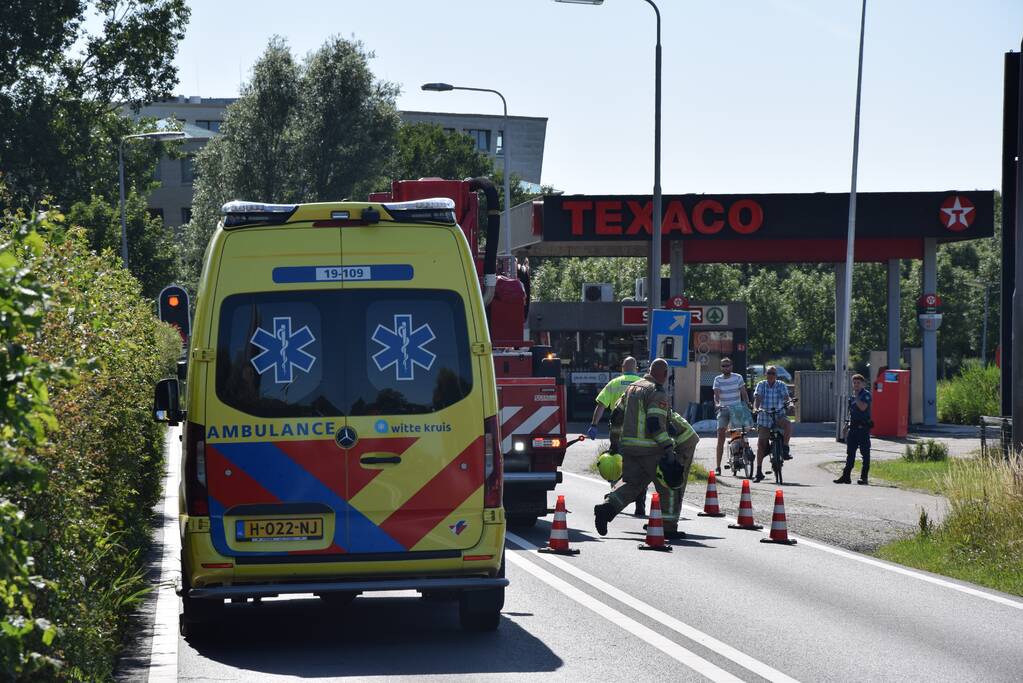 Bestuurder scootmobiel te water