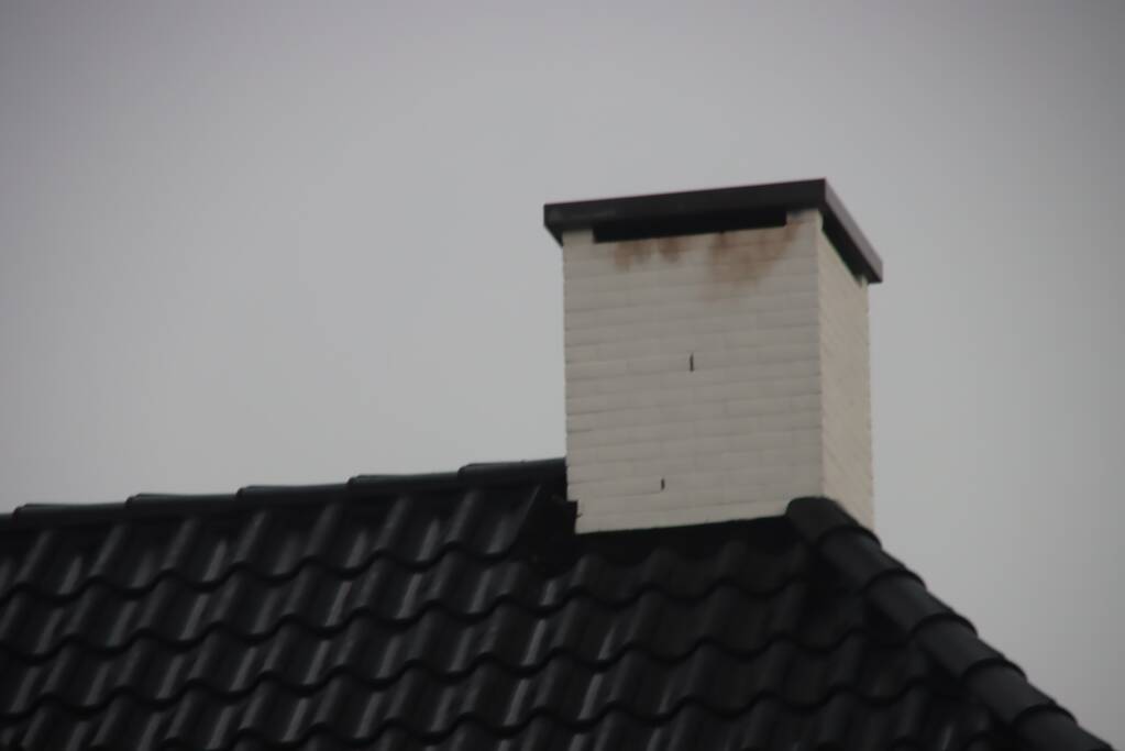 Blikseminslag in schoorsteen