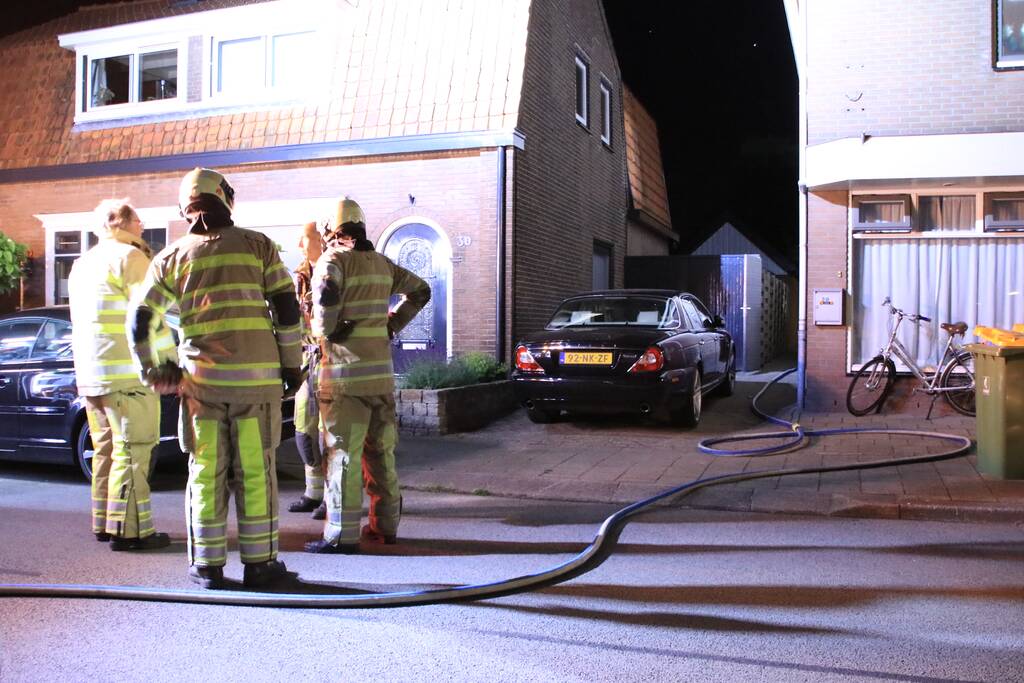 Buitenbrand achter woning