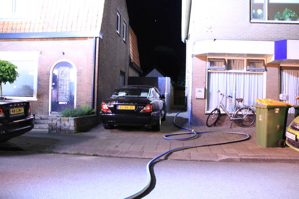 Buitenbrand achter woning