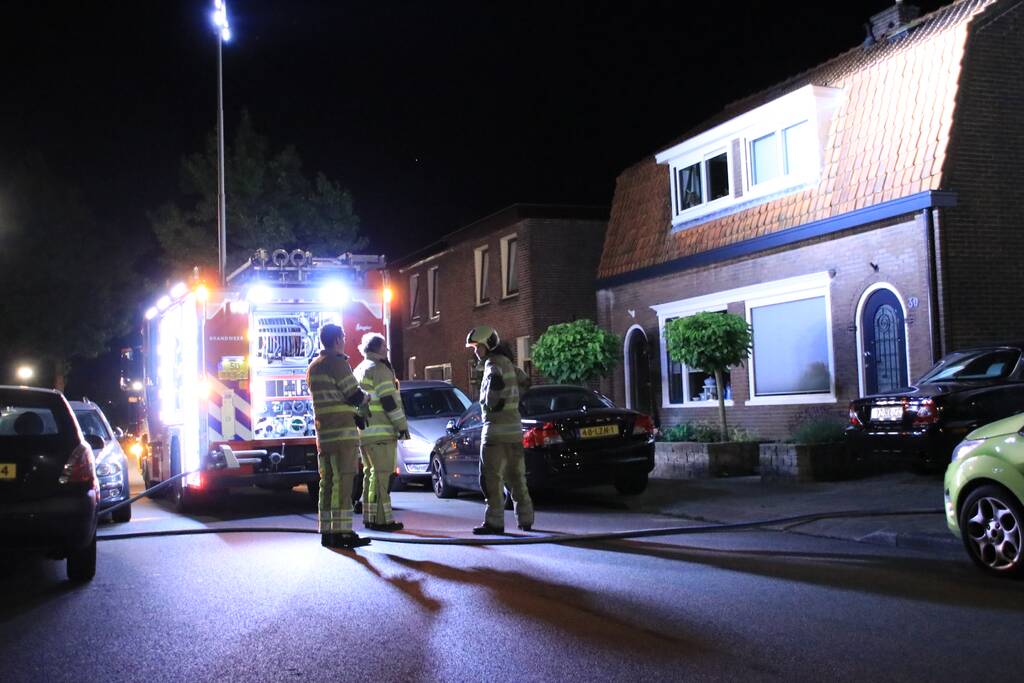 Buitenbrand achter woning