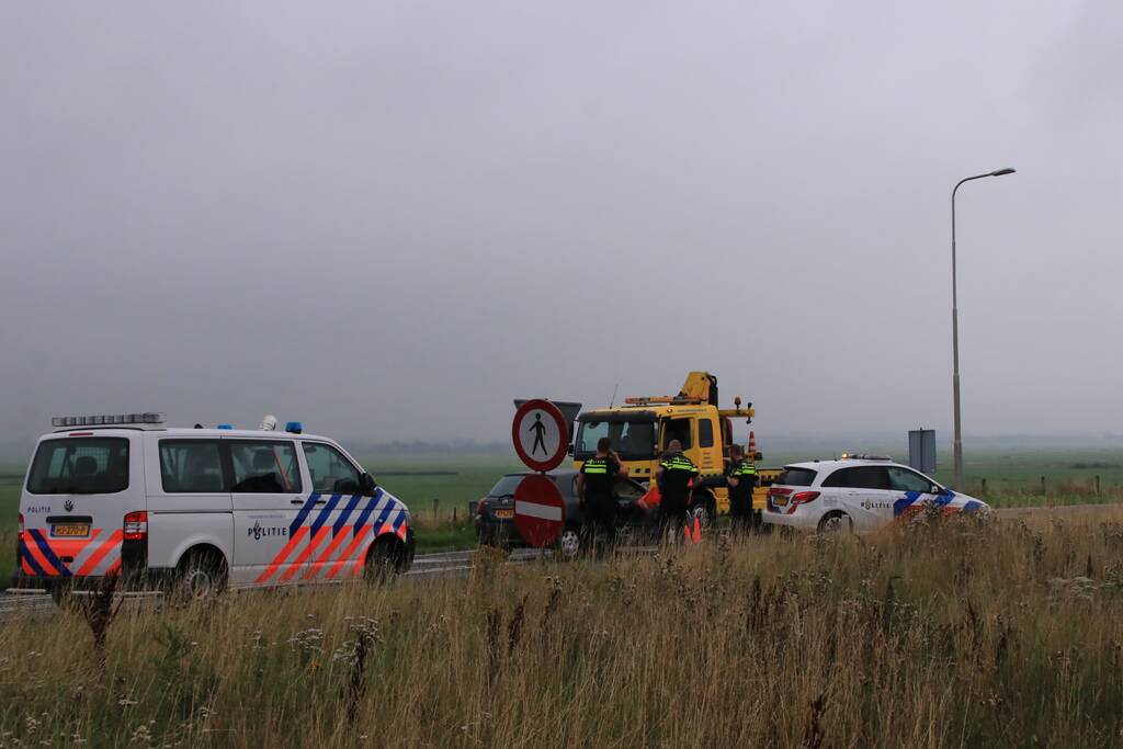 Politieauto ramt personenauto, inzittenden aangehouden