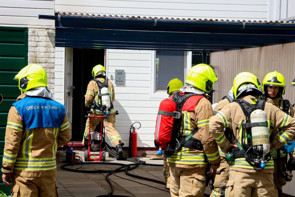 Uitslaande brand in tussenwoning