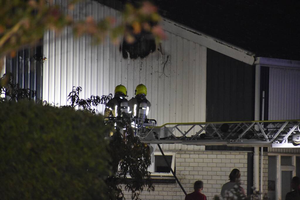 Buitenverlichting aan gevel in brand gevlogen