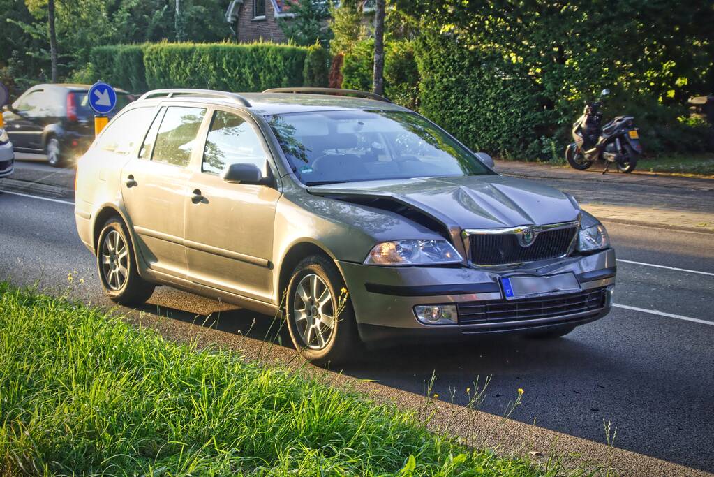Schade na kop-staartaanrijding
