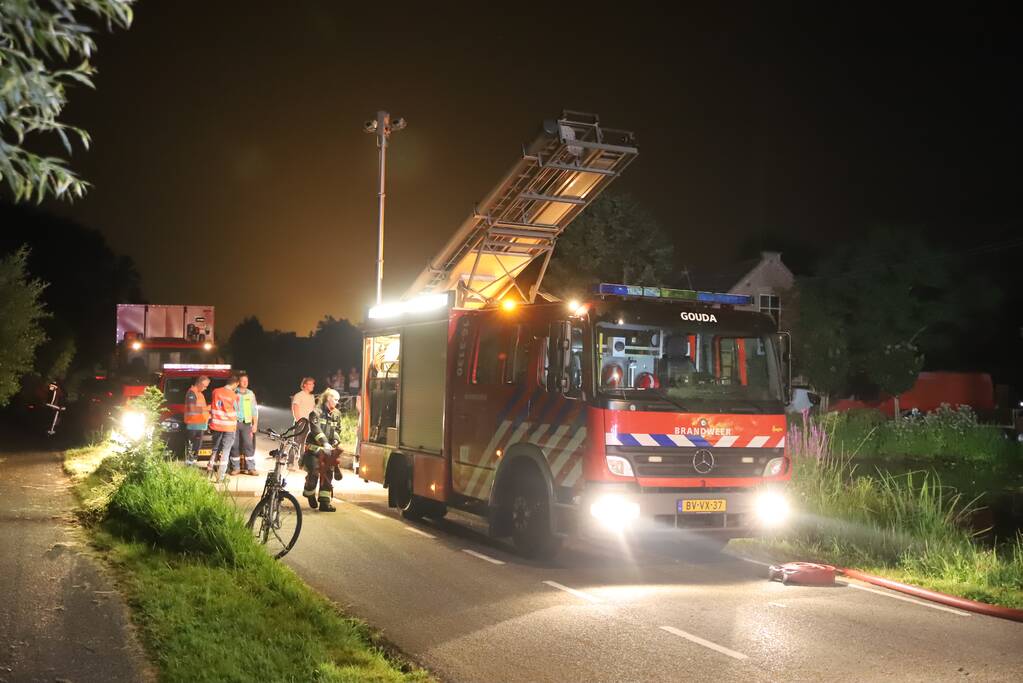 Grote schuurbrand vol met hooi