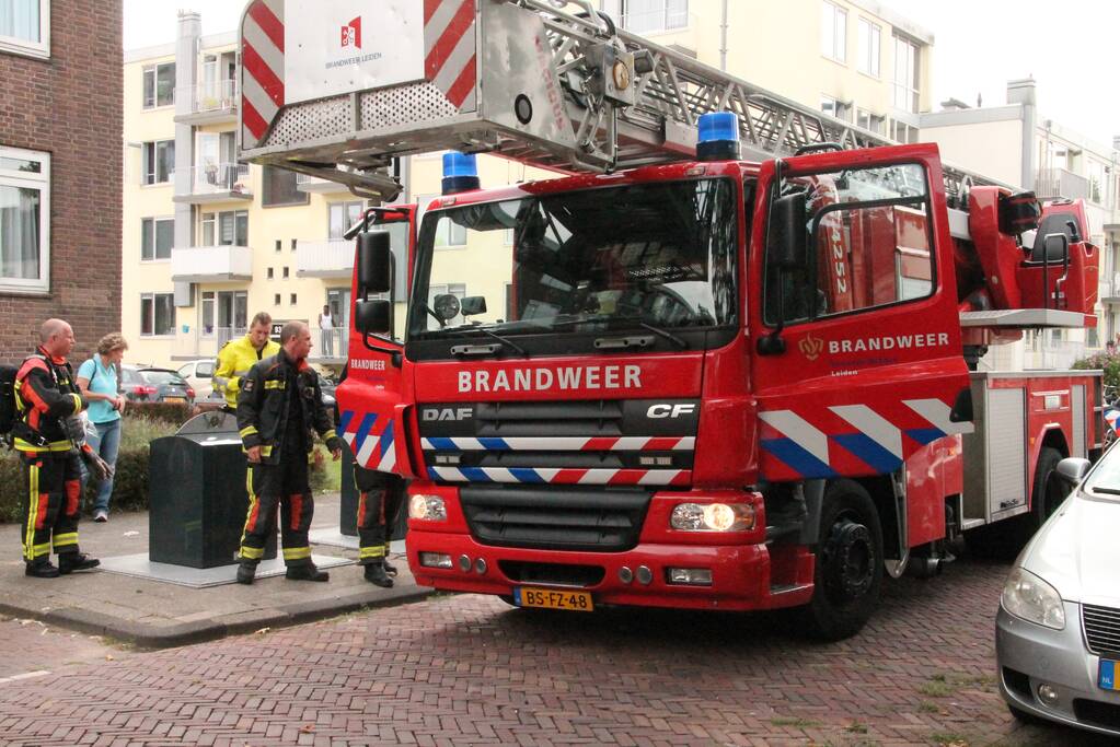 Brand in keuken van flatwoning
