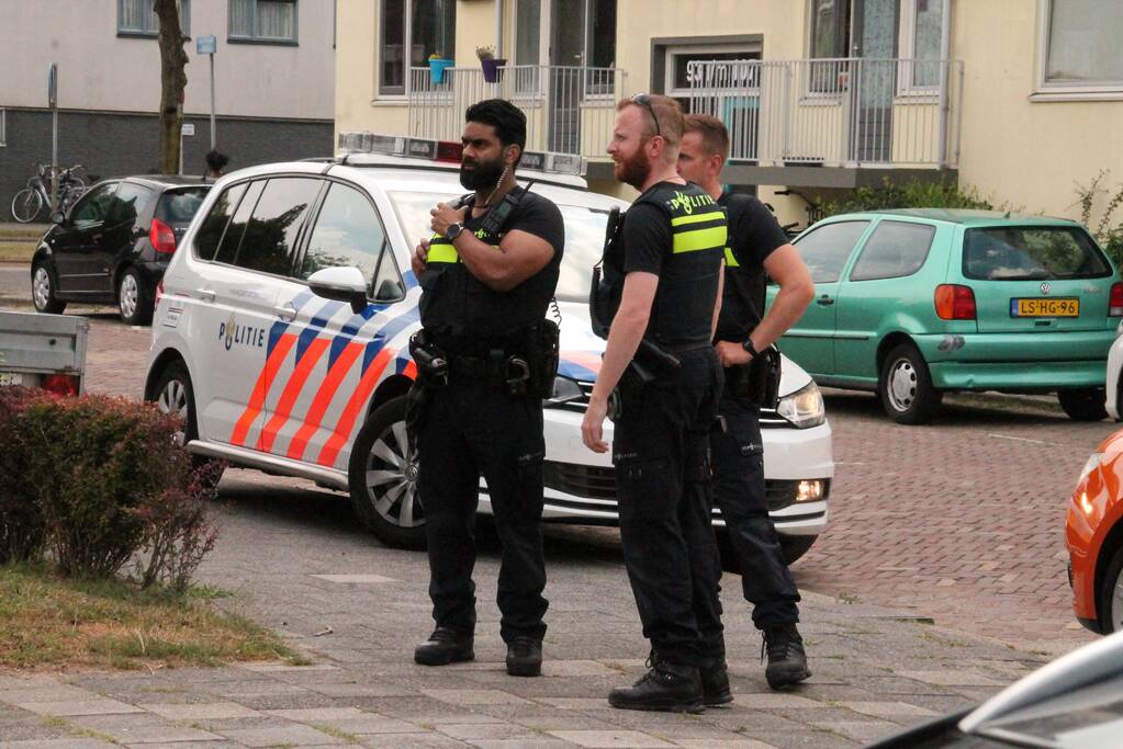 Brand in keuken van flatwoning