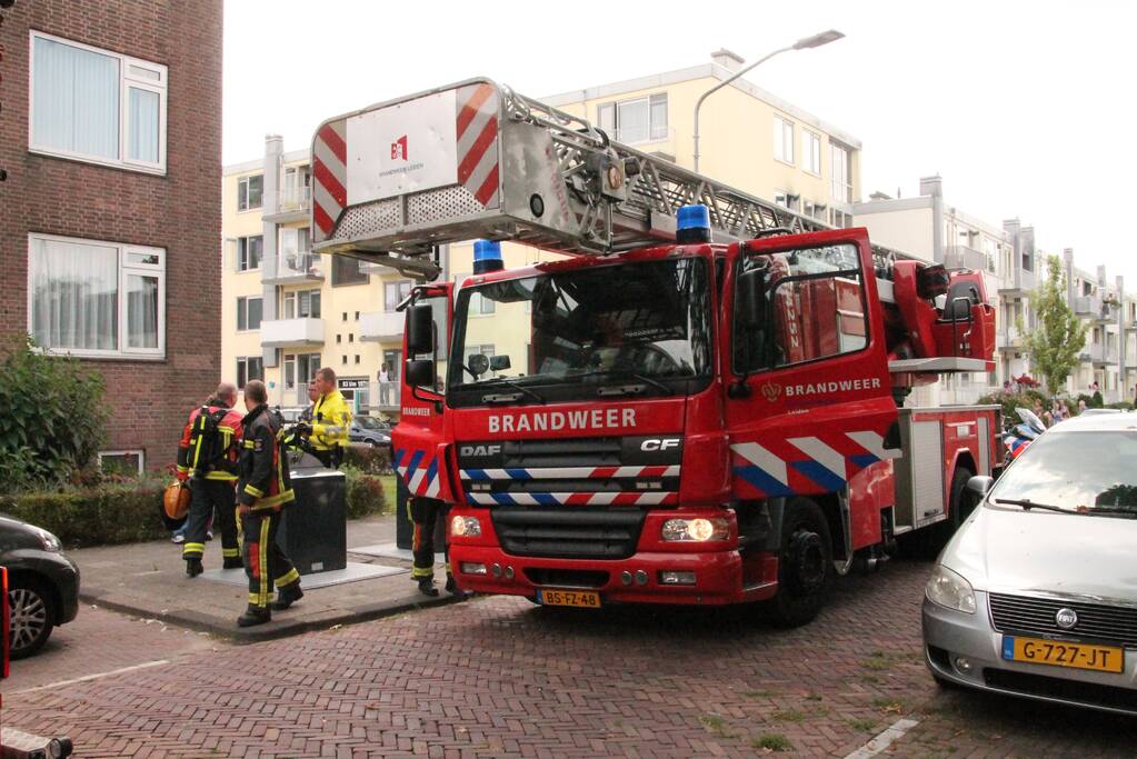 Brand in keuken van flatwoning