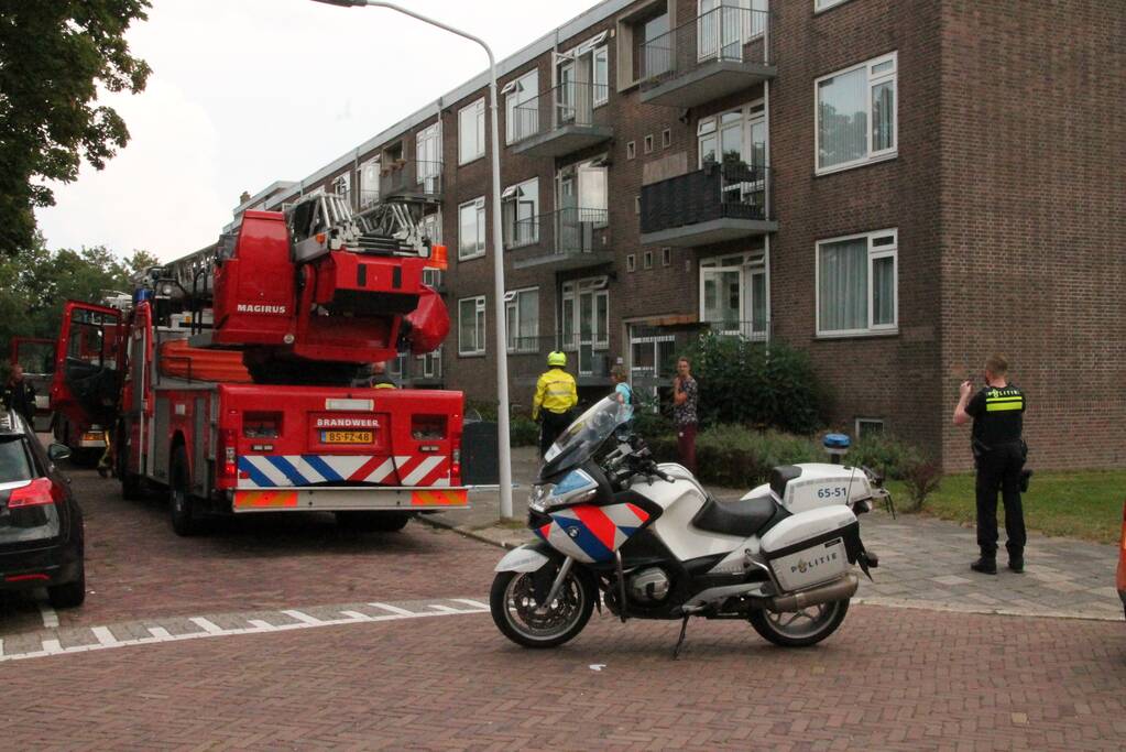 Brand in keuken van flatwoning