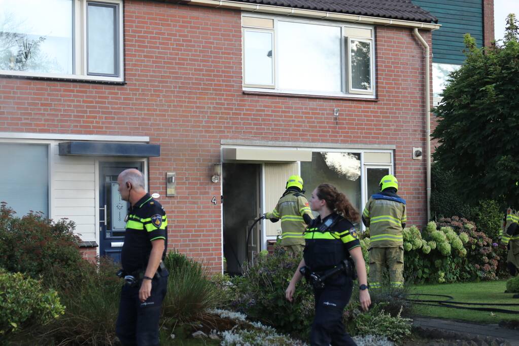 Veel rook bij woningbrand