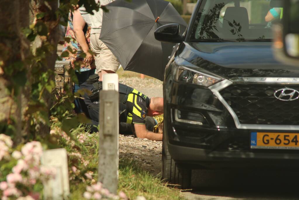 Opzittende scooter gewond na val