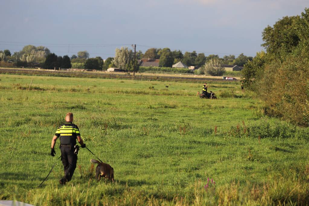 Zoekactie naar boeven in maisveld en water